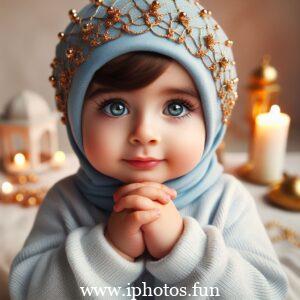 A baby doll dressed in a hijab and headscarf, showcasing cultural diversity and inclusivity