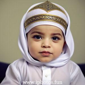 A baby wearing a white headscarf and necklace, looking adorable and innocent